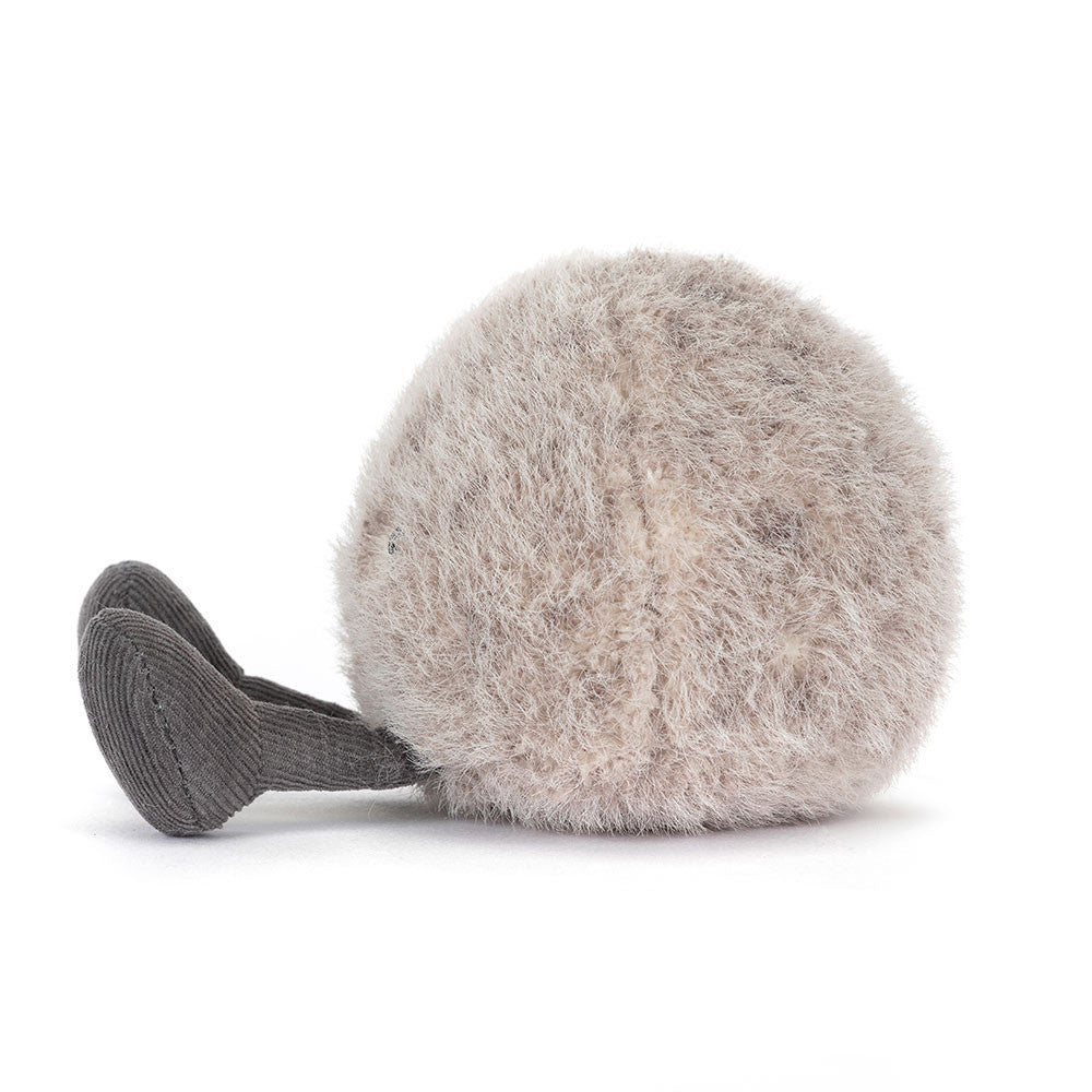 Side view of Jellycat Plush Amuseables Pebble Plush toy resembling a round pebble with grey feet on a white background