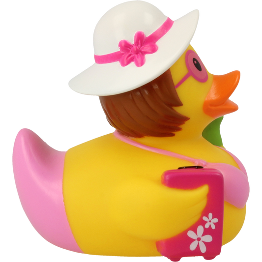 Side view of Lilalu Holiday Lady Rubber Duck wearing a white hat