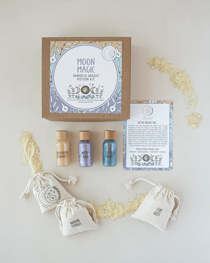 Moon Magic mindful magic product set with bottles, packaging, and drawstring bags on a light background.