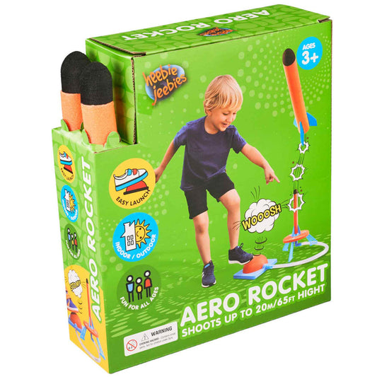 Box of aero rocket toy with a child playing with it on a green background