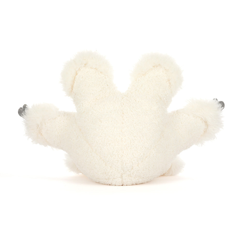 Back view of Jellycat Amuseables Snowflake showing fluffy plush texture and silvery thread detailing.