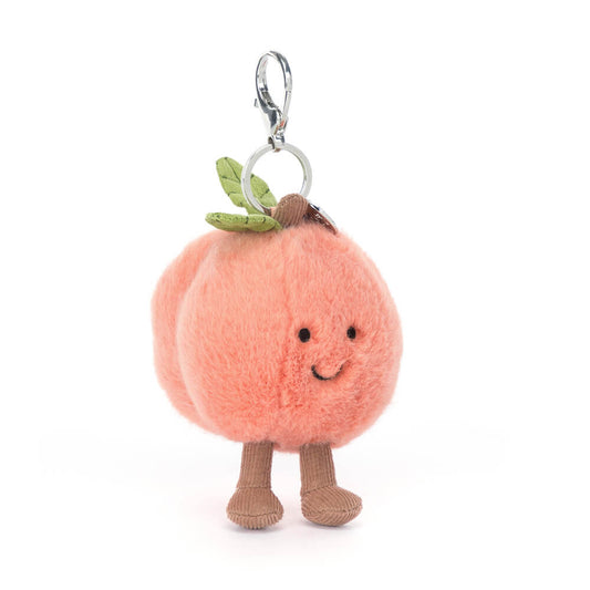 Plush Jellycat Amuseables Peach character keychain with a white background