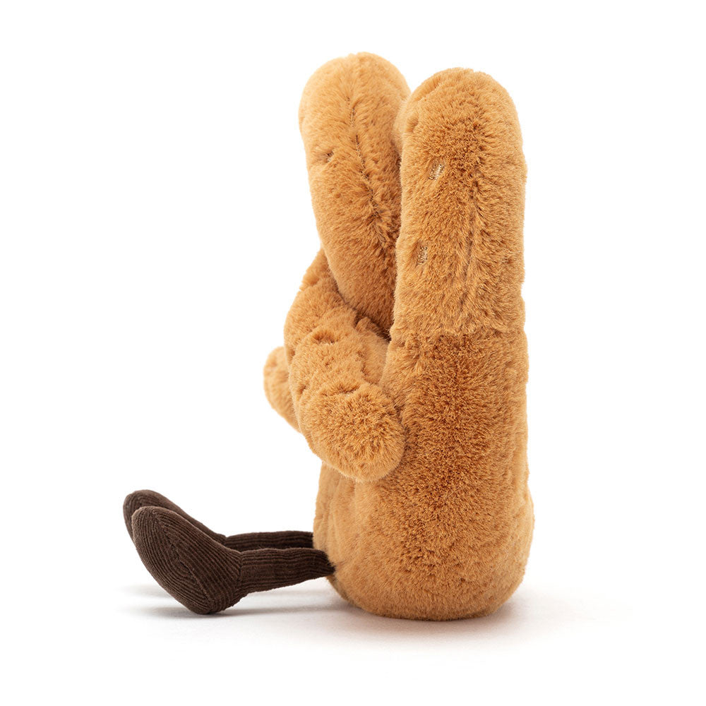 Side view of Jellycat Amuseables Pretzel ­