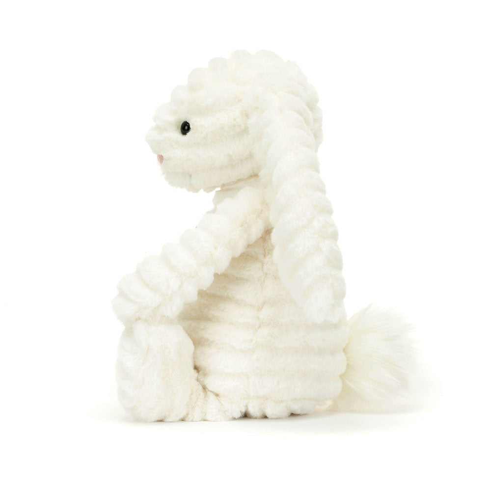 Side view of White Jellycat Plush Bashful Luxe Bunny Nimbus with fluffy tail on a white background