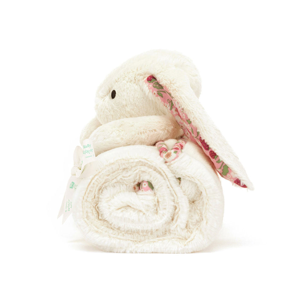 Side view of Jellycat Plush Blossom Cream Bunny Berry Blankie White plush toy with floral ribbon on a white background