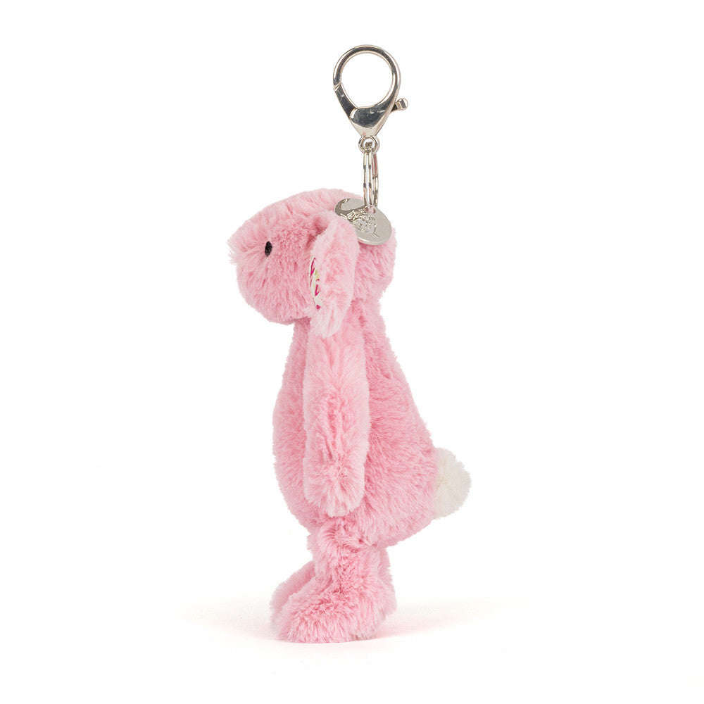 Side view of Jellycat Plush Blushkin Blossom Bunny Bag Charm against a white background.