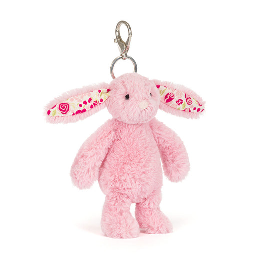 Front view of pink Jellycat Plush Blushkin Blossom Bunny Bag Charm against whte background.