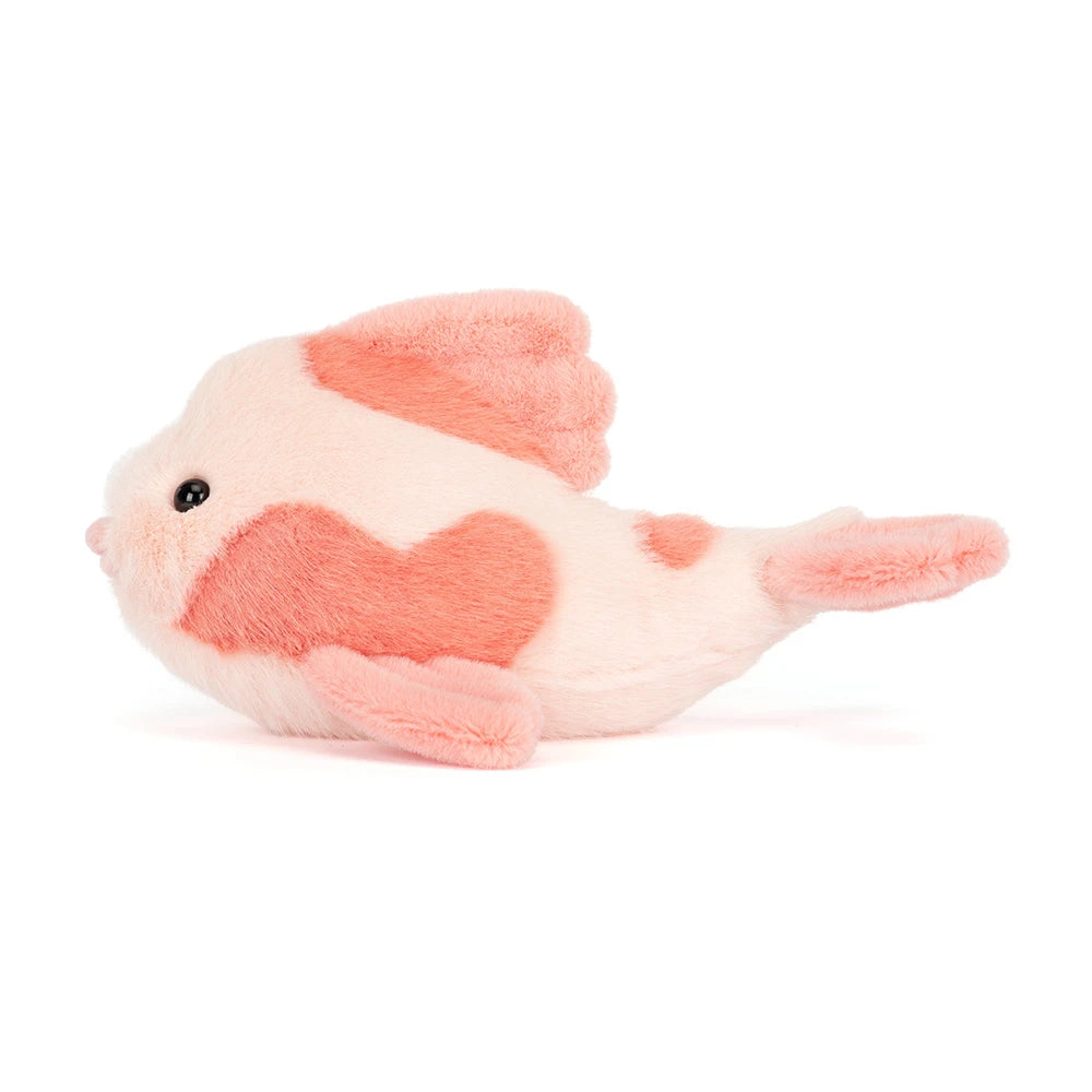Side view of Jellycat Plush Fancy Carp with pink fins and tail on a white background