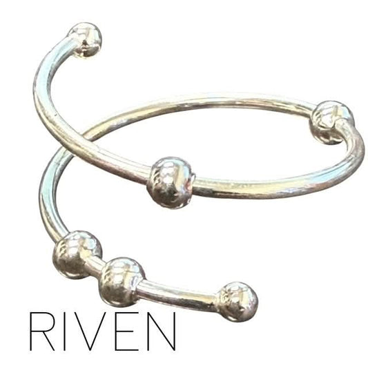 Kaiko Sterling Silver Fidget Ring Riven on a white background