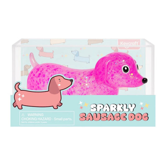 Keycraft Squishy Sparkly Sausage Dog Sparkly sausage dog toy in packaging with 'Keycraft' branding on a light blue background.