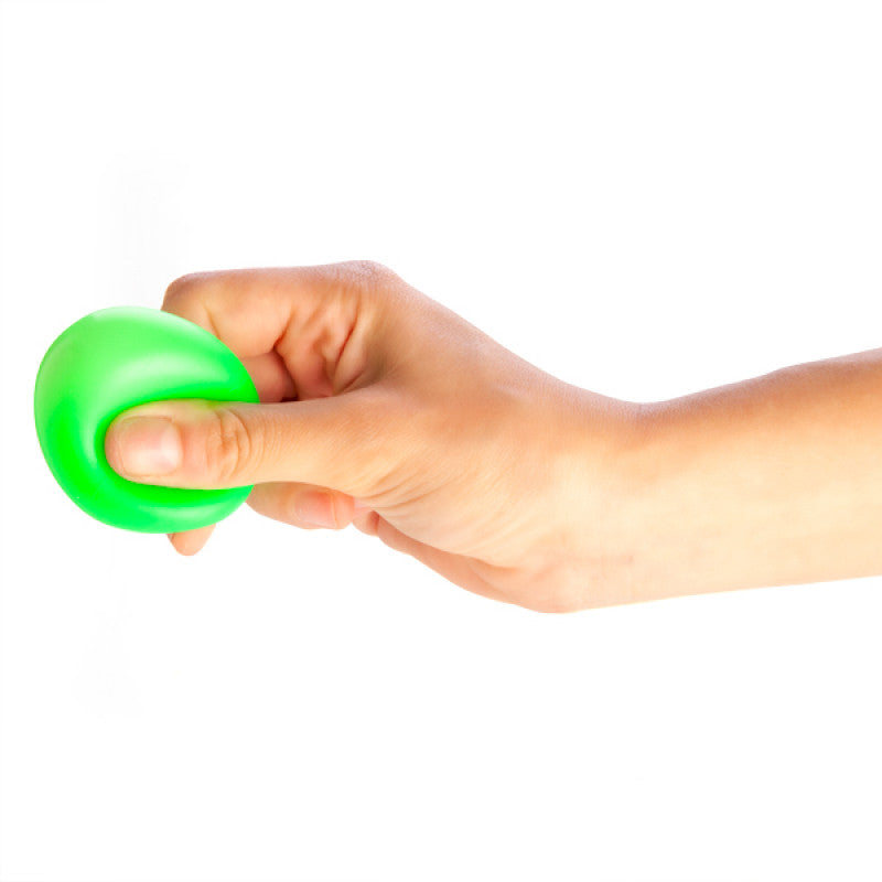 Hand holding a green Smooshos Sticky Splat Ballz stress ball against a white background