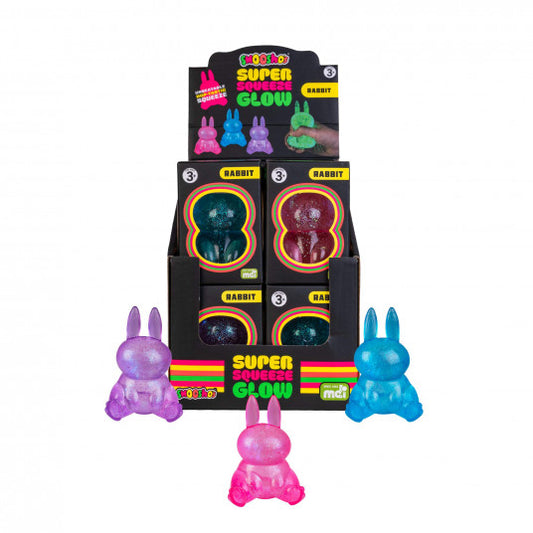 Display of colorful Smooshos Super Squeeze Glow In The Dark Bunny with packaging on a white background