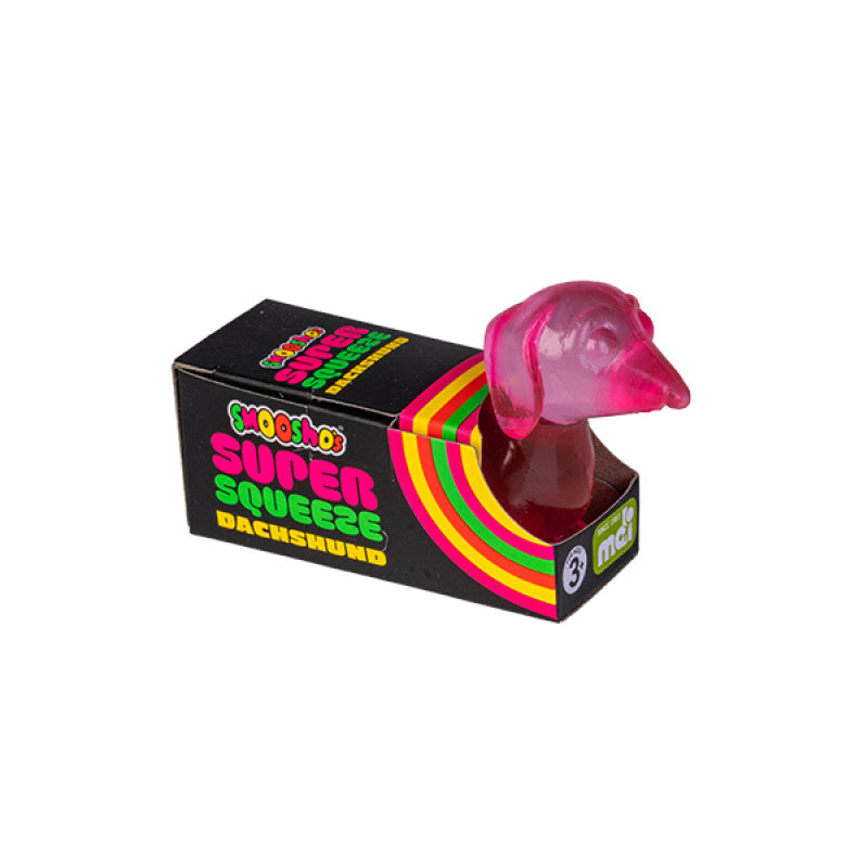 Smooshos Super Squeeze Glow in the Dark Dachshund Pink dog-shaped stress reliever with colorful packaging on a white background