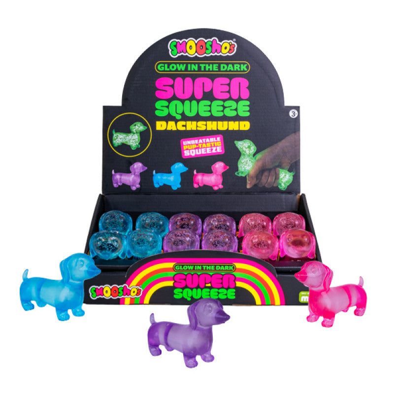Display of gSmooshos Super Squeeze Glow in the Dark Dachshund low-in-the-dark super squeeze dachshund toys with packaging.