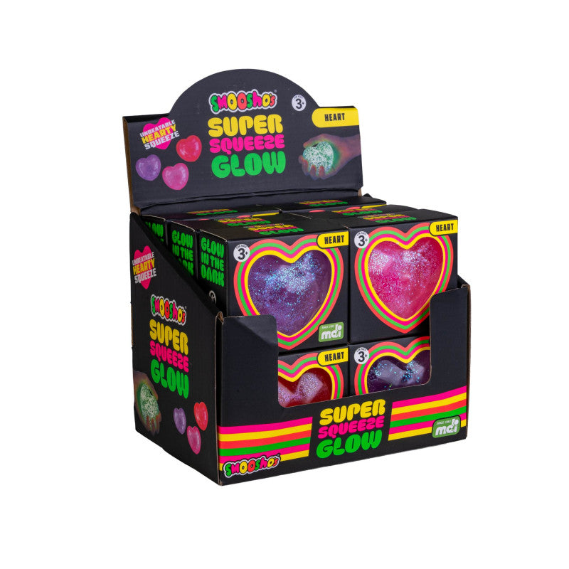 Display box of Super Squeeze Glow toys with heart shapes on a white background