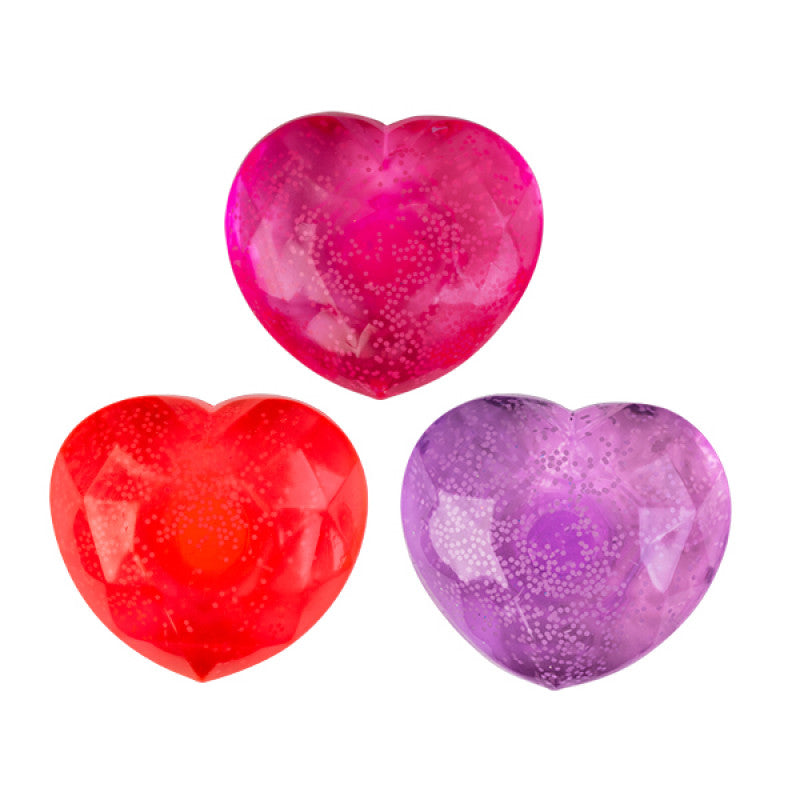 Three Smooshos Super Squeeze Glow in the Dark Heart in red, pink, and purple on a white background