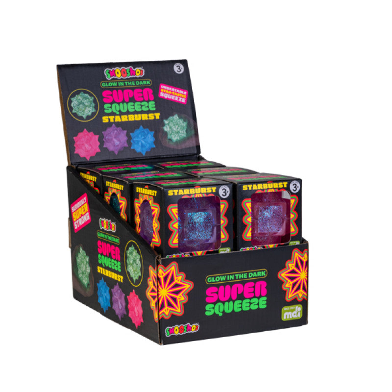 Display of Glow in the Dark Super Squeeze Starburst products with colorful packaging.