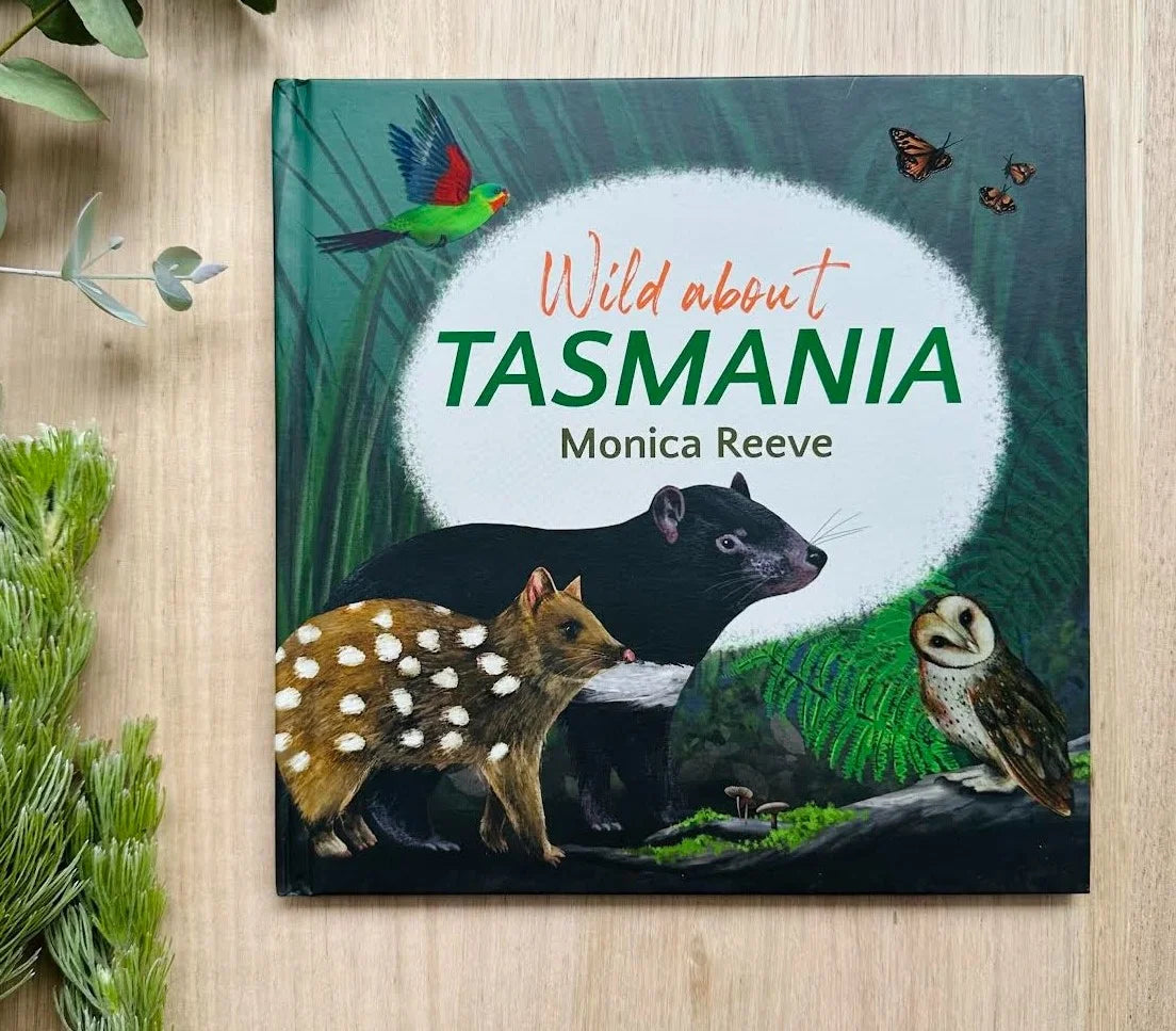 Book cover of Wild About Tasmania by Monica Reeve featuring a Tasmanian Devil, Quoll and Owl
