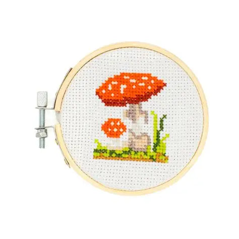 Kikkerland Mini Cross Stitch Embroidery Kit Mushroom on a white background