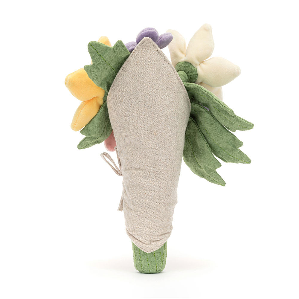 Jellycat Amuseables Bouquet of Flowers plush toy from Plato’s, shown from the side, featuring soft pastel blooms in a smiling fabric wrap