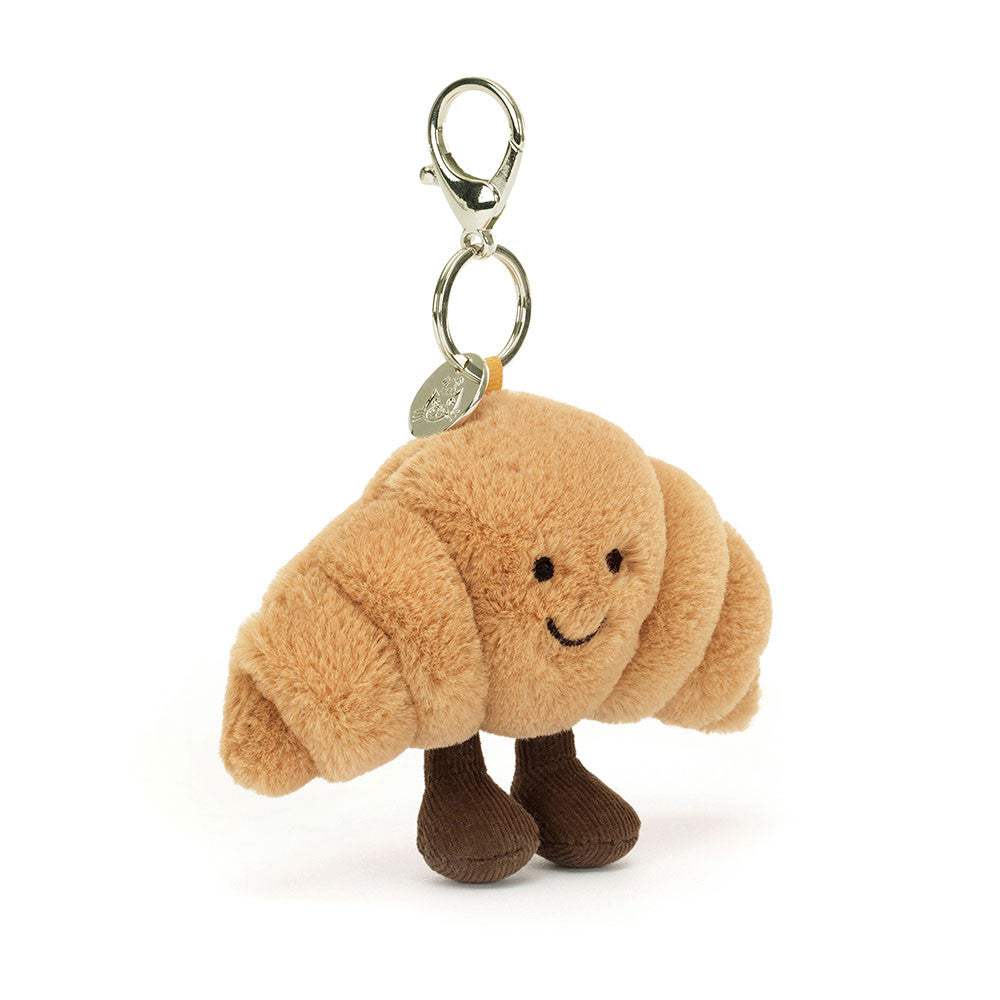 Jellycat Amuseables Croissant Bag Charm – soft plush pastry accessory, perfect for gifts, bags, and playful collectors.