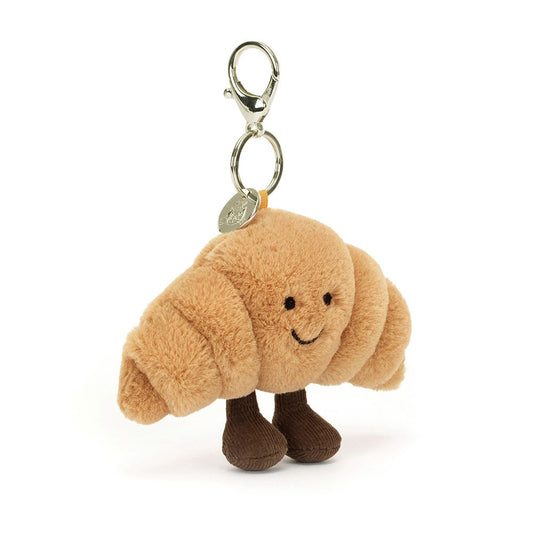 Jellycat Amuseables Croissant Bag Charm – soft plush pastry accessory, perfect for gifts, bags, and playful collectors.