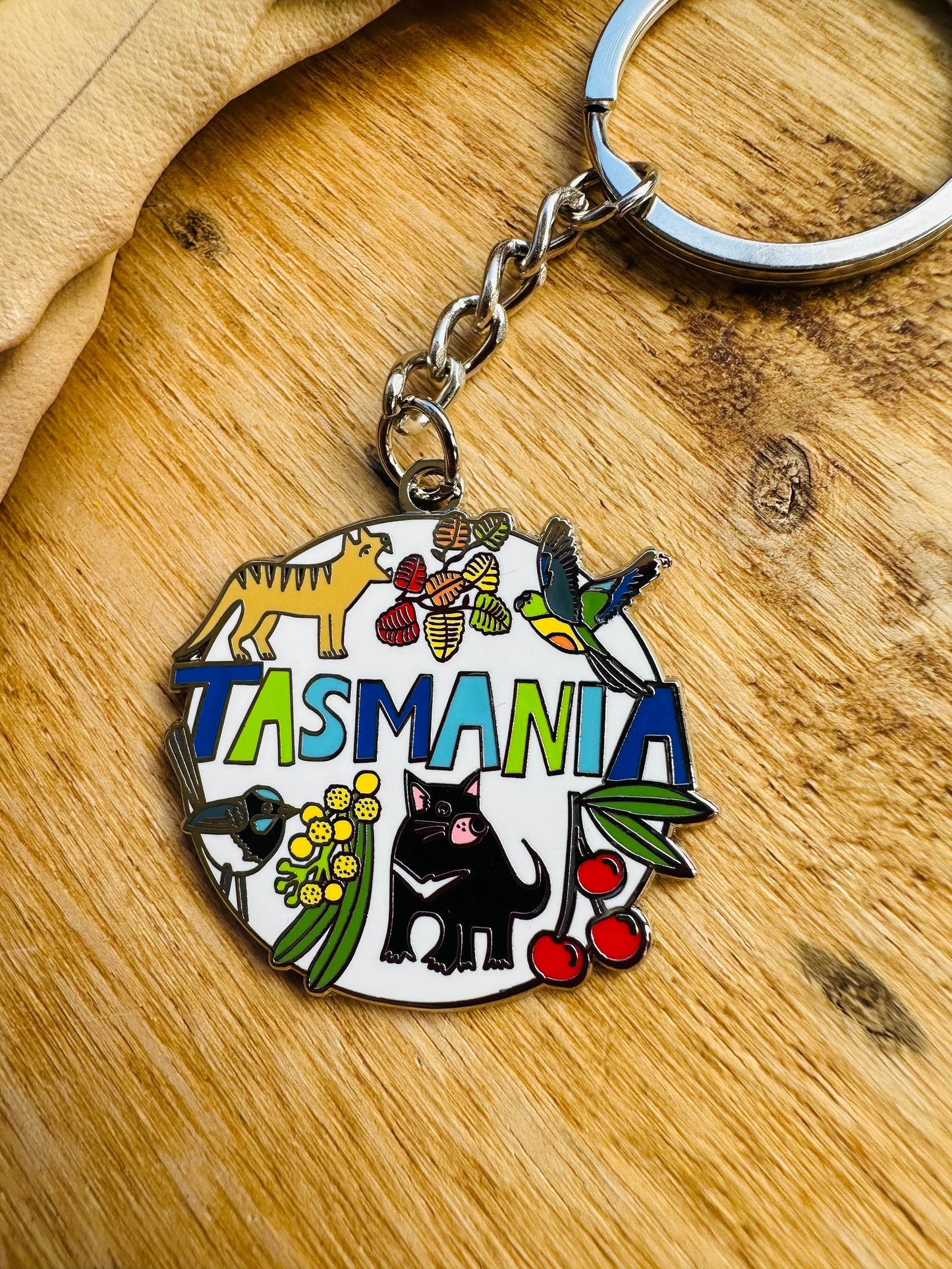 Pigment by Monica Reeve Enamel Keyring Tasmania